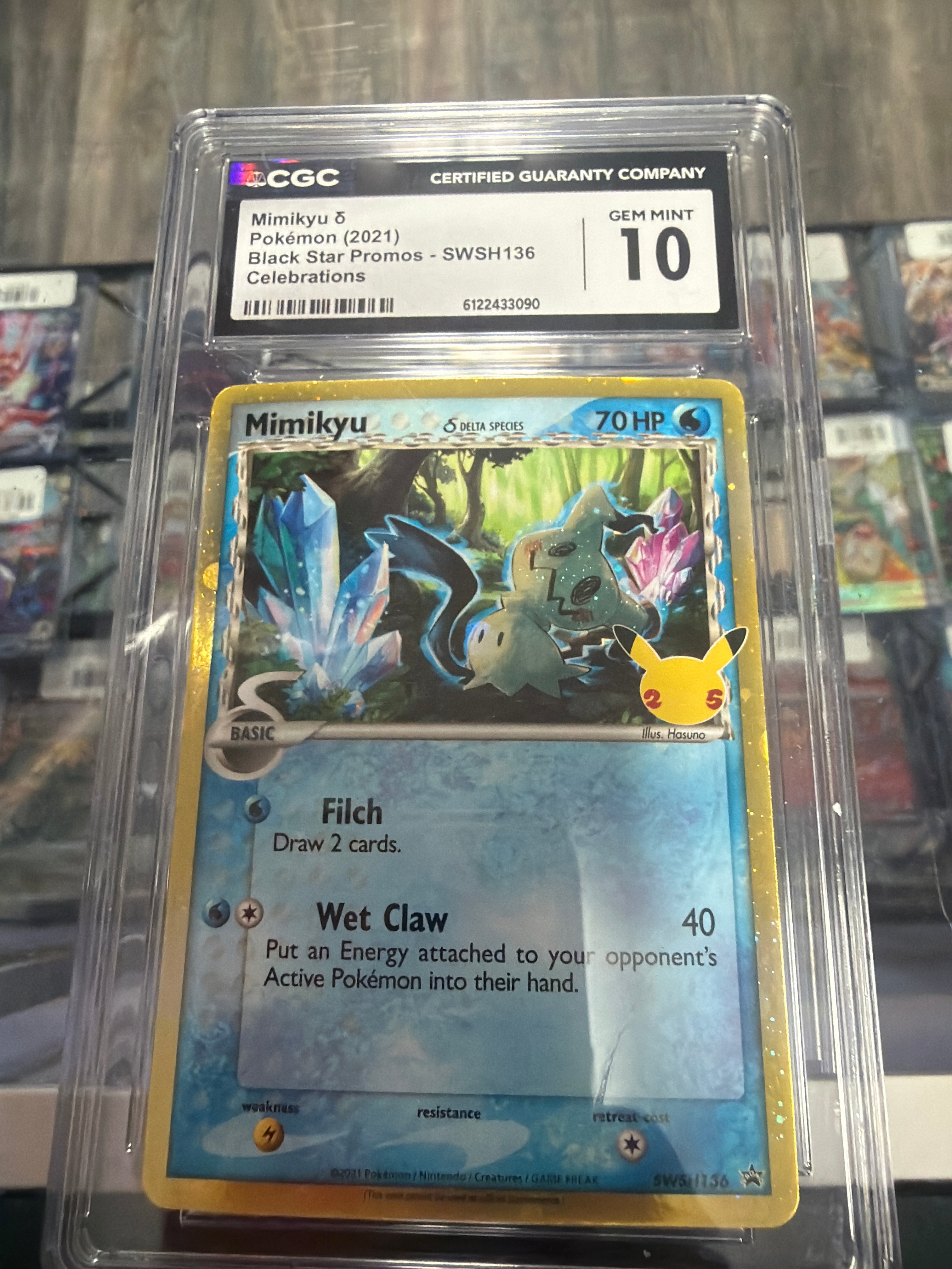 Pokémon 2021 SWSH Promo Mimikyu SWSH136 Celebrations Holo Beckett 8.5